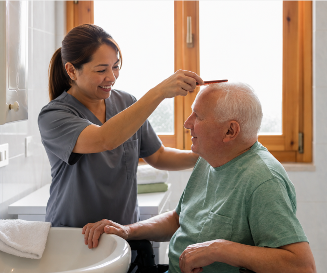 Caregiver assisting an older adult with a personal care routine